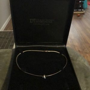 Sterling silver necklace with blue topaz pendant